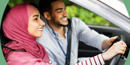 family member teaching a learner driver to drive