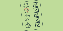 Illustration of a carbon reducing footprint, including a train for public transport, cycling, energy, reducing meat and recycling.