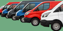 Several vans parked in a row